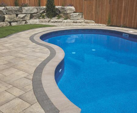Patio: Rialto 60mm, Champagne with Onyx inset Pool coping: Cassina, Dover