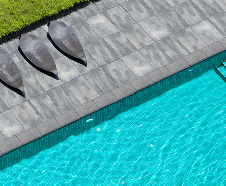 Pool coping using Oasis Bullnose with Nueva XL Slab from Brampton Brick